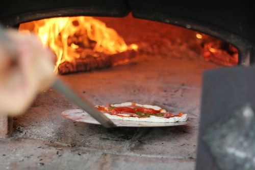 Pizza evening cooked over a wood fire