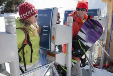 Couple of skiers passing the gates