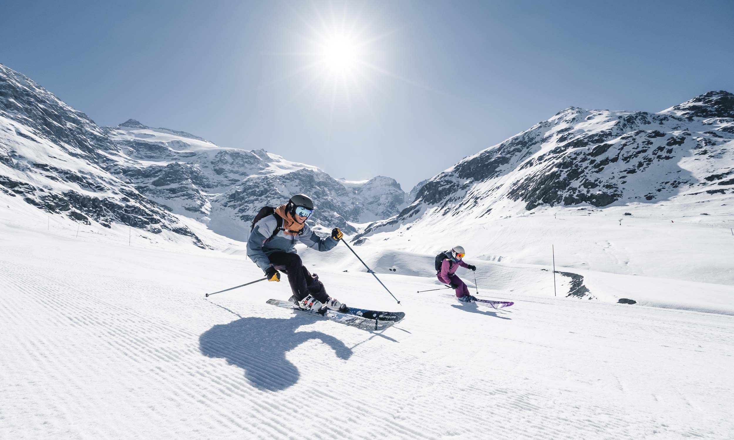 Duo sliding on the ski area of Bonneval sur Arc